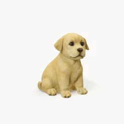 Figura de jardín perro sentado