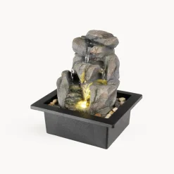 Fuente de jardín de piedras con luz LED