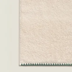 Toalla de tocador con pespunte Unimax