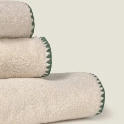 Toalla de tocador con pespunte Unimax